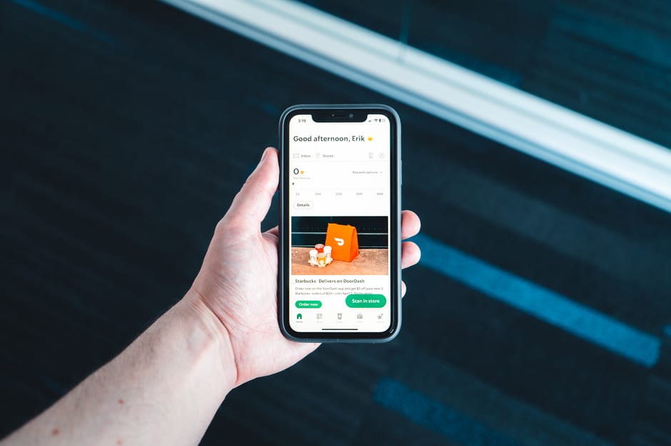 Customer ordering food on phone from restaurant app