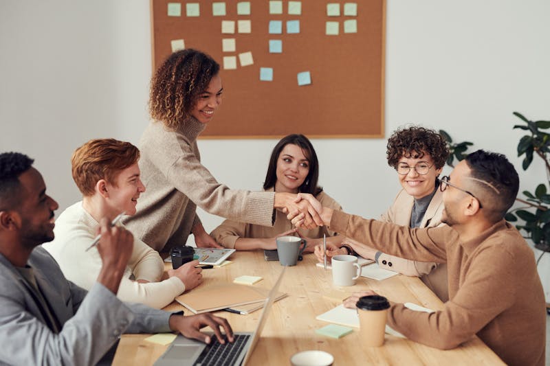Business team planning migration on whiteboard